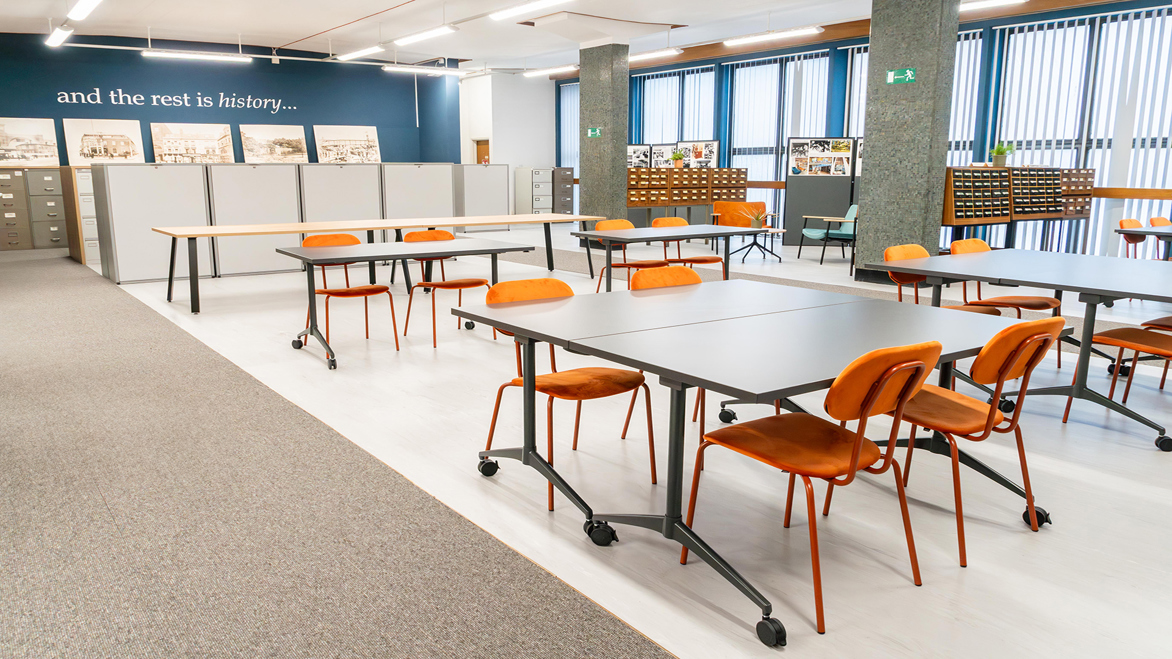 Tables and chairs of the study area inside the library