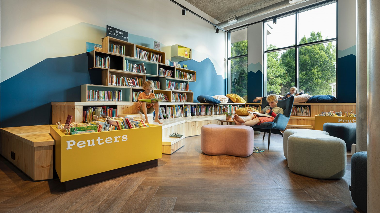 A couple of children relaxing in Uithoorn Library's children's area