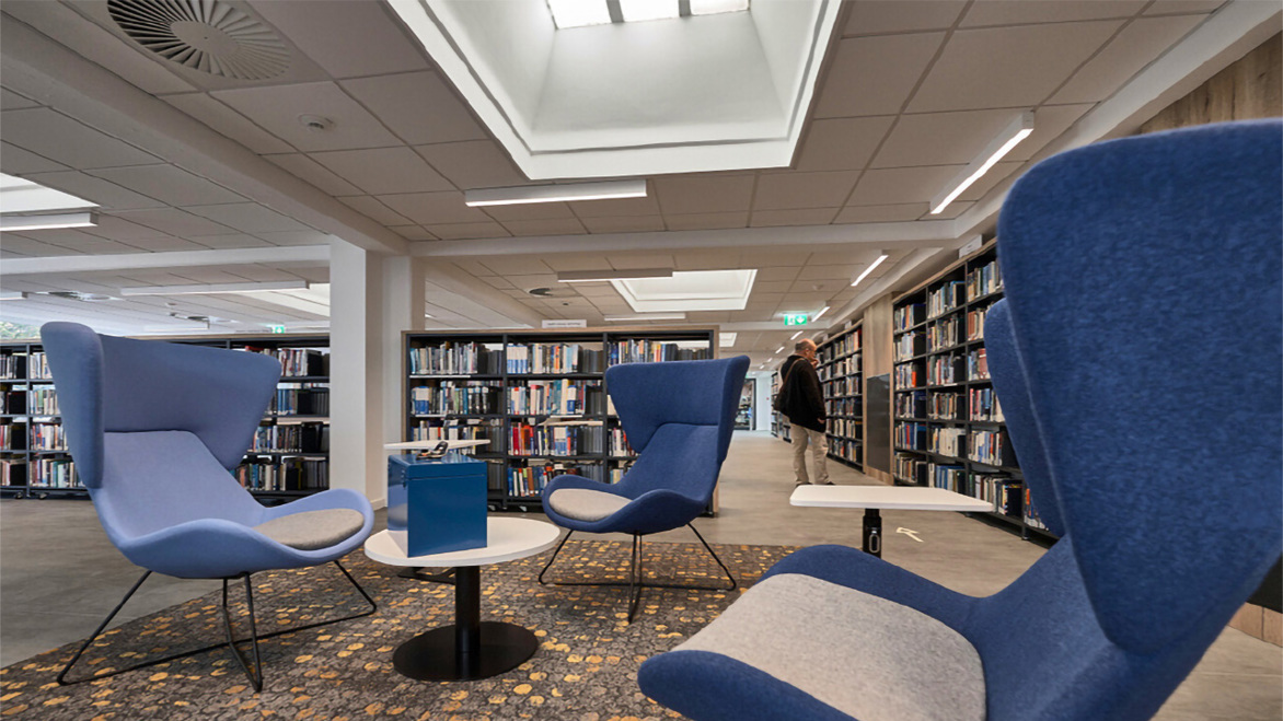 CERN Library spacious interior comfortable blue seats