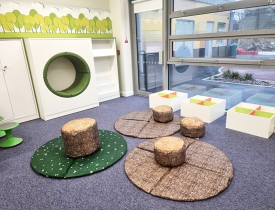 A photo showing Hillbourne Primary School Library's tree styled seats