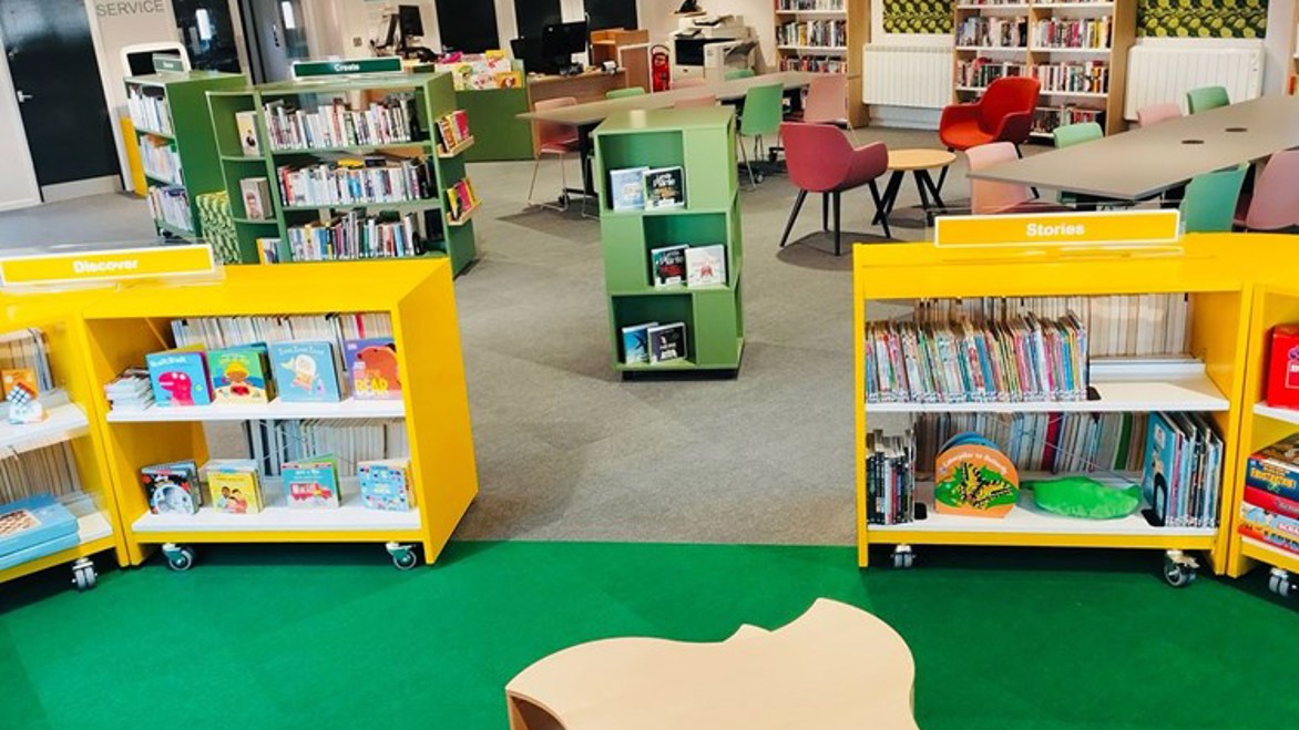 Northmoor Library interior with bright yellow bookshelves