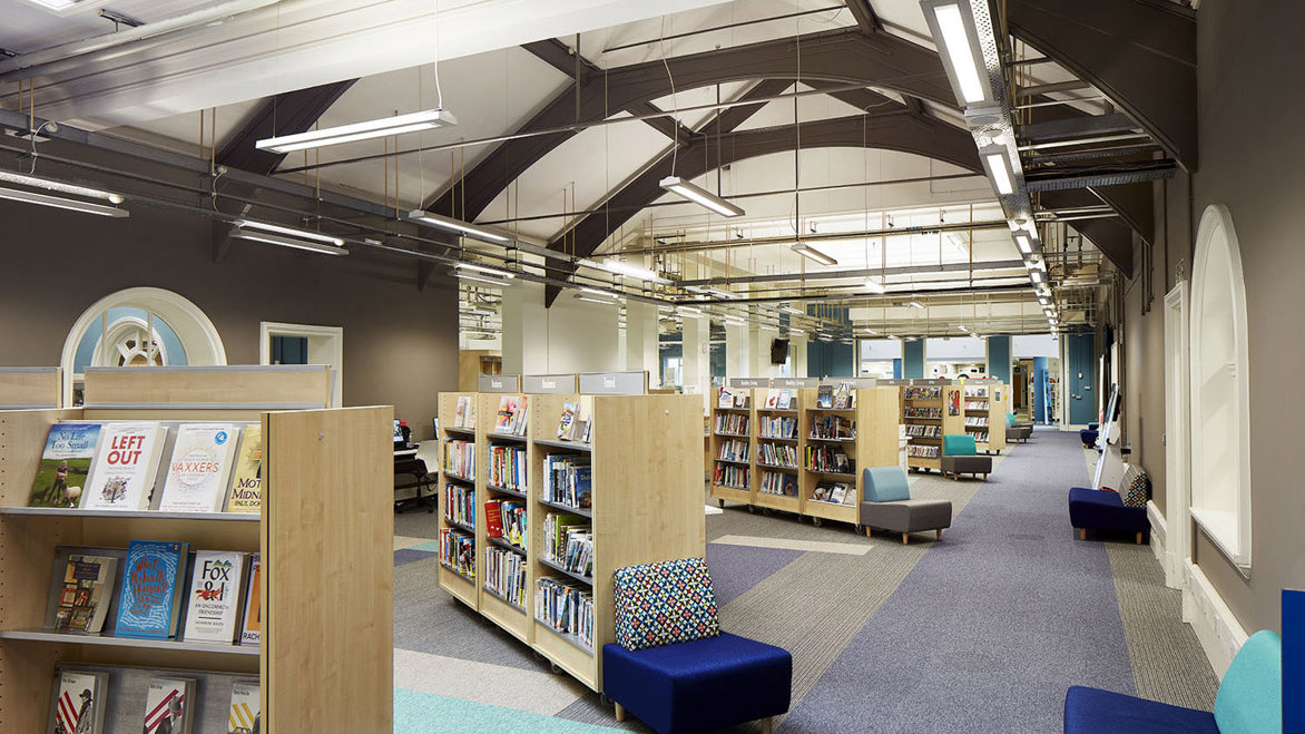 Interior of Eltham public library showing a light and airy design full of bookshelves