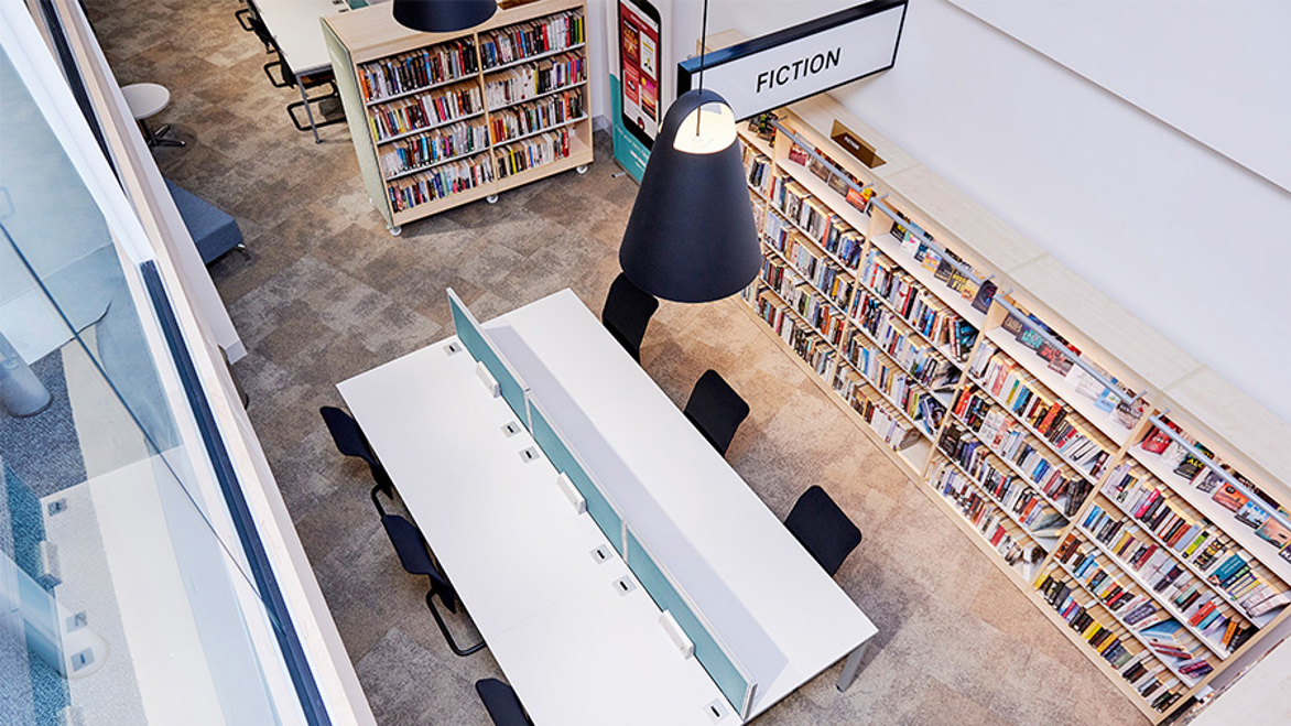 Top view showing the fiction section and study table in Greenhill library